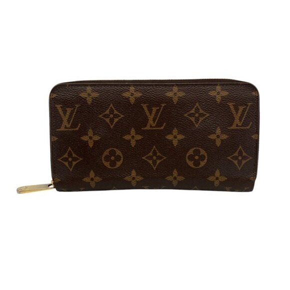 LOUIS VUITTON Brown Monogram Wallet - Picture 1 of 10